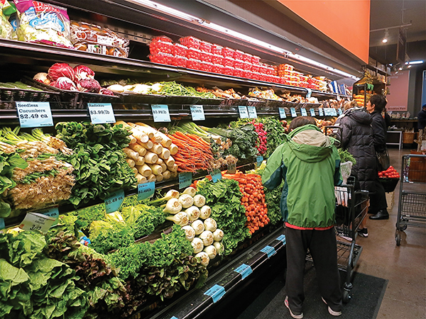 A BRIGHT SPOT IN THE VILLAGE SUPERMARKET SAGA: The large selection, good quality, and reasonable prices in the produce department repeat in other departments throughout the store. Photo by Maggie Berkvist.