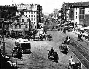 1870 Along Canal Street, looking west towards the Hudson River, this snapshot of the past is reminiscent of the Old West, with its horses, wagons, trolley tracks and wooden buildings. The history of New York City (1855–1897) started with the inauguration in 1855 of Fernando Wood as the first mayor from Tammany Hall, an institution that would dominate the city throughout this period. Growth of the poor immigrant working class combined with increasing economic consolidation eventually became The Five Boroughs in 1898. Ulysses S. Grant, our eighteenth president from 1869 to1877 is laid to rest at Grant's Tomb in Morningside Heights. Photo: Anonymous