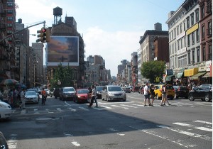 2015 Probably the most congested intersection in the city, especially during festivals. Crowds shop the narrow sidewalks, street vendors and storeowners compete for space on Canal Street where you can buy practically anything. It is hard to imagine this famous bustling street, bordering between Little Italy and Chinatown was once a Fresh Water Pond. Polluted from commercial waste, it was drained in 1814 with the pond’s underground springs redirected to flow into the Hudson River. Photo: Stan Fine