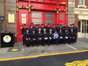 CELEBRATING 150 YEARS: Active members of FDNY Squad 18 in front of their newly refurbished firehouse facade. Photo by Katherine Sharp.